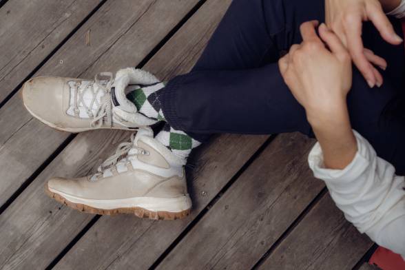 Close-up of cream-coloured outdoor hiking boots with a sporty look